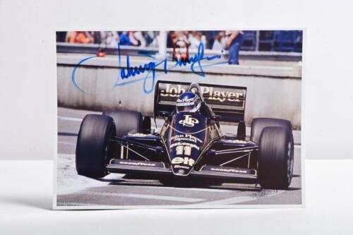 DUMFRIES: A colour picture of Johnny Dumfries racing a JPS Lotus 98T. Johnny Dumfries signature