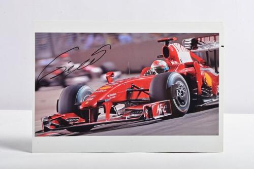 FISICHELLA: A colour picture of Giancarlo Fisichella driving a Ferrari F60. Giancarlo Fisichella signature