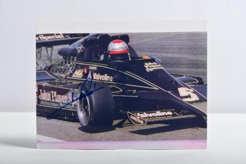 ANDRETTI: A colour picture of Mario Andretti racing a Lotus 79. Picture signed by Mario Andretti