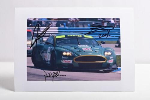 ASTON MARTIN: A colour picture of a 2005 Aston Martin DBR9 as raced by Geoff Brabham, Darren Turner and Stephane Sarrazin. Picture signed by all drivers