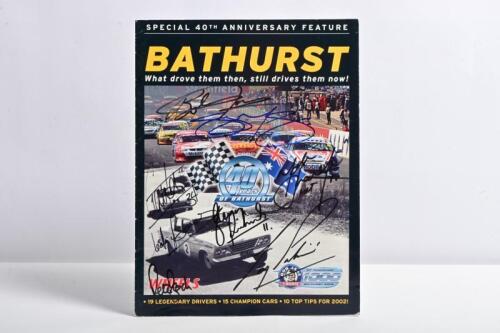 BATHURST: A 'BOB JANE MT PANORAMA 1000 BATHURST 2002' Special 40th Anniversary Feature as prepared by 'WHEELS'. Front cover signed by various A.T.C.C and V8 Supercars identities including Colin Bond, Larry Perkins, Mark Skaife & others
