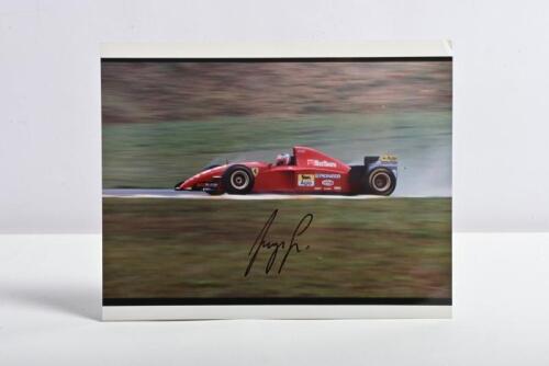 BERGER: A colour image of Gerhard Berger racing a Ferrari 412T2. Picture signed by Gerhard Berger