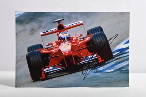 SALO: A colour picture of Mika Salo in a Ferrari F399. Mika Salo signature
