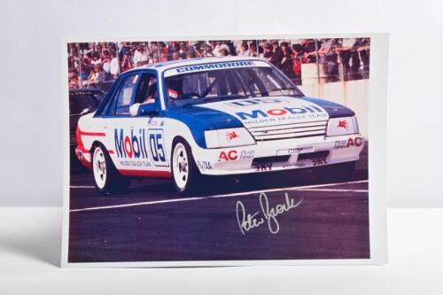 BROCK: A colour picture of the 1985 Mobil '05', HDT VK Holden Commodore as raced by Peter Brock. Peter Brock signature