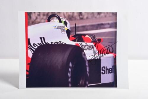 JOHANSSON: A colour picture of Stefan Johansson in a Marlboro McLaren. Picture signed by Stefan Johansson. Circa 1986