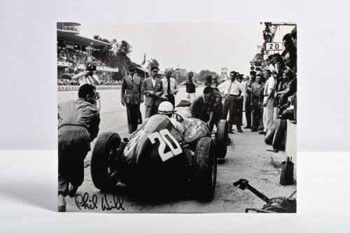 HILL: A black and white picture of Phil Hill in the pits driving a Ferrari F1 256. Phil Hill signature