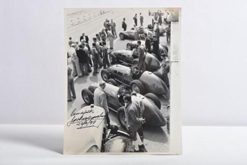 JOSE FROILAN GONZALEZ: A superb 'THE GEORGE MONKHOUSE COLLECTION' black and white photograph depicting a scene from the 1951 French Grand Prix. Jose Froilan Gonzalez signature