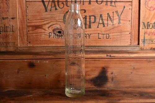 SHELL: An early New Zealand "Shell" embossed one quart oil bottle