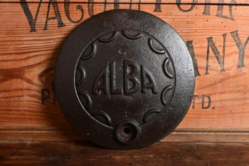 ALBA: An early Alba domed cast iron petrol station tank cover, 24cm diameter