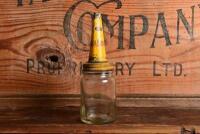 FIREZONE: An early small oil bottle with "HG Sleigh Firezone" tin pourer