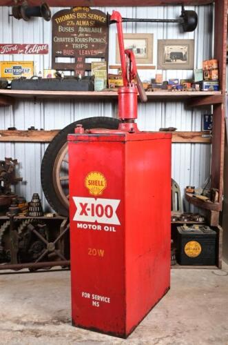 SHELL: A highboy oil pump in original 1950/60s Shell livery, with embossed Shell clam branding to pump, 136cm high approx