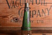 CASTROL: A 1940/50s embossed "Castrol Wakefield" one imperial quart oil bottle with green painted tin pourer and dust cap - 3