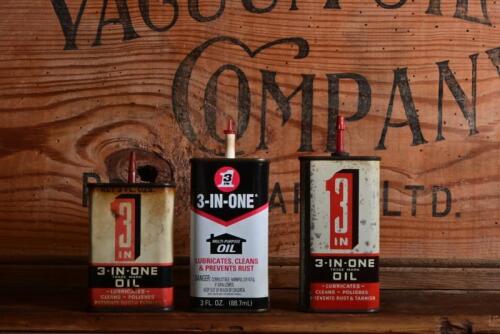 3-IN-ONE: Three three fluid ounce "3-IN-One" oil tins, two Australian and one USA