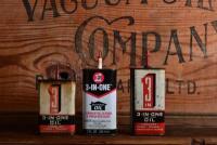 3-IN-ONE: Three three fluid ounce "3-IN-One" oil tins, two Australian and one USA