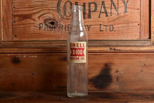SHELL: An early New Zealand "Shell X-100" one pint oil bottle