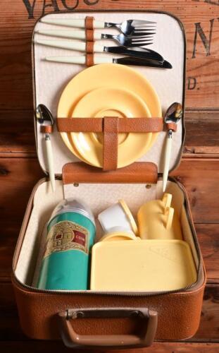 PICNIC BASKET: A leatherette cased motorists picnic basket with full accompaniments