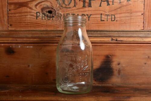 CASTROL: A 1940/50s embossed "Castrol Wakefield" one imperial quart oil bottle