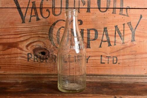 VACUUM: An early New Zealand "Mobiloil" embossed one imperial pint oil bottle