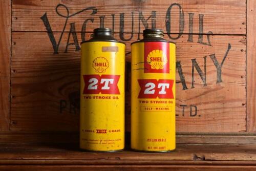 SHELL: Two "Shell 2T Two Stroke Oil" tin, one circa 1950s one imperial quart with no lid and one circa 1960s one quart