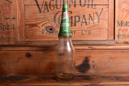 CASTROL: A circa 1950/60s "Castrol" one quart oil bottle, with circa 1950/60s Castrol CW 30-40 MS" tin pourer and dust cover