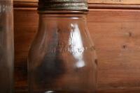 MOBIL: An imperial pint and two imperial quart oil bottles with circa 1950s "Mobiloil" tin pourers - 3