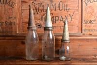 MOBIL: An imperial pint and two imperial quart oil bottles with circa 1950s "Mobiloil" tin pourers - 6