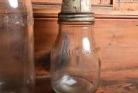 MOBIL: An imperial pint and two imperial quart oil bottles with circa 1950s "Mobiloil" tin pourers - 10