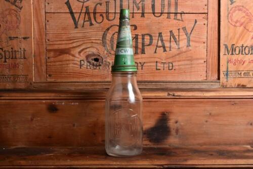 CASTROL: A circa 1950/60s "Castrol" one quart oil bottle, with circa 1950/60s Castrol CW 30" tin pourer and dust cover