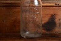 CASTROL: A circa 1950/60s "Castrol" one quart oil bottle, with circa 1950/60s Castrol CW 30" tin pourer and dust cover - 2