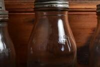 OIL POURERS: A half litre and two pint oil bottles with tin pourers, including Shell - 4