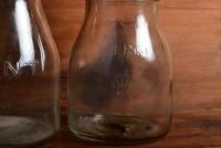 OIL POURERS: A half litre and two pint oil bottles with tin pourers, including Shell - 9
