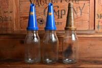 GOLDEN FLEECE: Three one litre oil bottles with plastic "Golden Fleece" pourers
