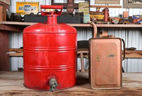 VACUUM OIL CO: A red painted unbranded petrol can with a circa 1930s Mobiloil tap, together with a a copper painted oil can, largest 41cm high