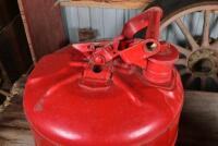 VACUUM OIL CO: A red painted unbranded petrol can with a circa 1930s Mobiloil tap, together with a a copper painted oil can, largest 41cm high - 4