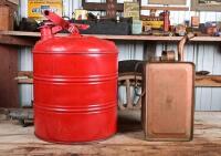VACUUM OIL CO: A red painted unbranded petrol can with a circa 1930s Mobiloil tap, together with a a copper painted oil can, largest 41cm high - 8