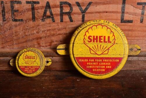 SHELL: Two 1950s Shell metal drum seals