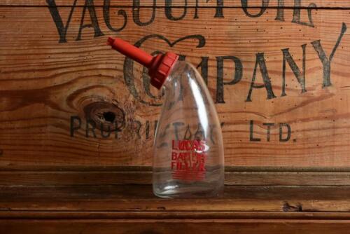 LUCAS: A "Lucas Battery Filler" bottle with original pourer and plunger, 19cm high