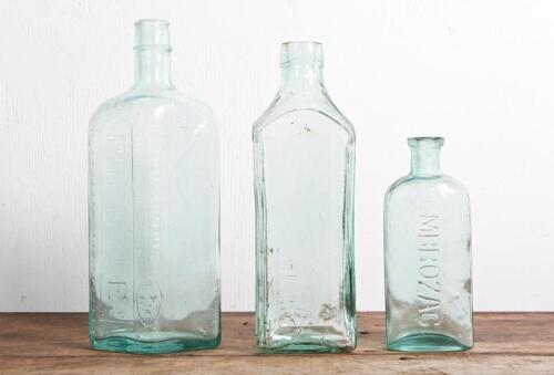 CHEMISTS BOTTLES: Three vintage chemist's bottles, tallest 24cm high