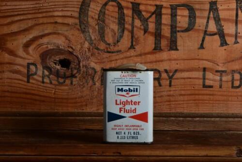 MOBIL: A 1950/60s "Mobil Lighter Fluid" four fluid ounce tin