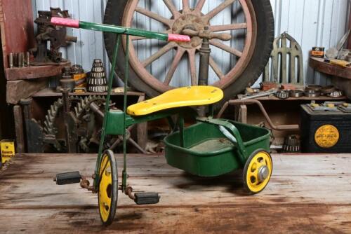 CHILDRENS TRICYCLE: A circa 1960s yellow and green painted children's tricycle with tray
