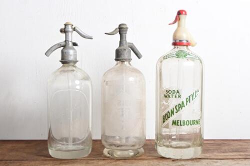 SODA SIPHONS: A collection of three vintage soda siphons, including "Boon Spa Pty Ltd, Melbourne", tallest 32.5cm