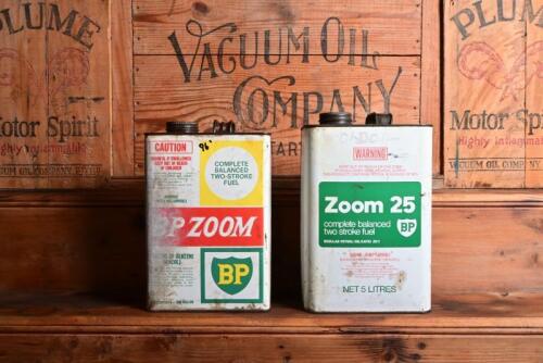 BP: Two one gallon BP Zoom two stroke fuel tins
