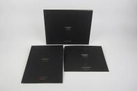VANQUISH: A group of three Aston Martin Vanquish sales brochures.