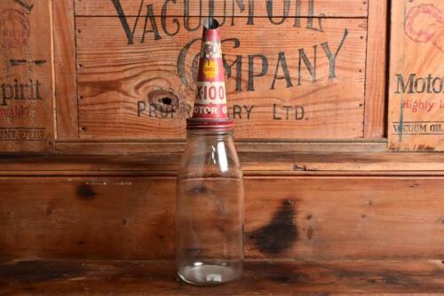 SHELL: A one quart oil bottle, with 1950/60s "Shell X-100 Motor Oil" tin pourer
