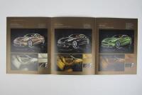VANQUISH: A group of three Aston Martin Vanquish sales brochures. - 6