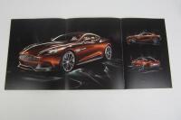 VANQUISH: A group of three Aston Martin Vanquish sales brochures. - 7