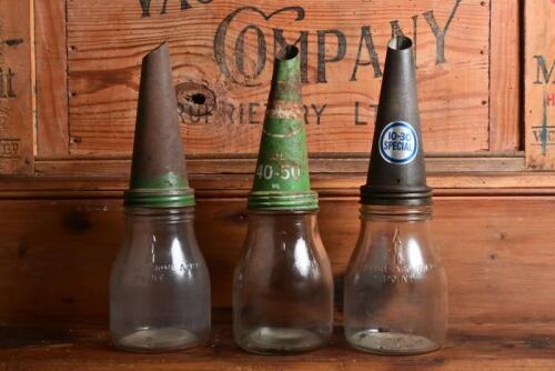 CASTROL: Two pint and one imperial pint oil bottles with "Castrol" tin pourers