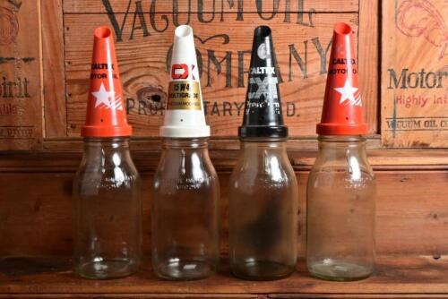 CALTEX: Four four litre oil bottles with plastic "Caltex" pourers