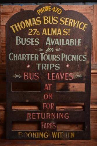 BUS BOARD: A nice early Thomas Bus Service masonite depo window display board, 60.5cm high, 38cm wide
