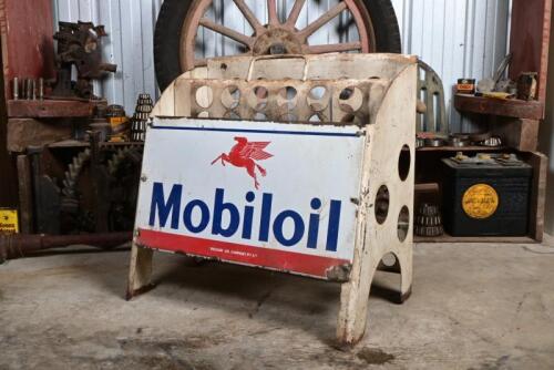 MOBIL OIL: A Mobile Oil 10 bottle rack with "Vacuum Oil Company Pty Ltd" printed to enamelled face, 53cm high, 54cm wide